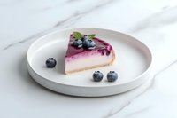 Slice of blueberry cheesecake with fresh berries and purple glaze on white ceramic plate against marble background, appetizing dessert photography.
