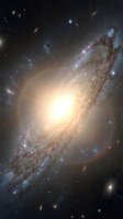 Stunning spiral galaxy with glowing core, dust lanes, and star-forming regions set against a deep space background full of distant galaxies.