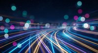 Abstract digital highway with glowing light trails and colorful bokeh effects representing high-speed data transfer and futuristic technology concepts.