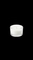 White scented candle in clear glass container with single wick, isolated on transparent background. Ready for t-shirt design, clipart, stickers, print-on-demand and sublimation projects.