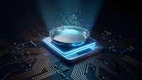 Futuristic microchip processor with glowing blue light and digital particles on dark circuit board background for technology concepts.