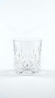 Crystal cut glass tumbler with diamond pattern isolated on white background for luxury dining and beverage service.
