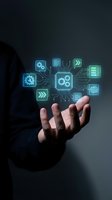 Businessman hand presenting glowing digital technology icons with processor chip and circuit connections for modern business solutions.