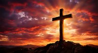 Wooden cross silhouette against dramatic sunset sky with vibrant orange and red clouds over mountain landscape for spiritual and religious themes.