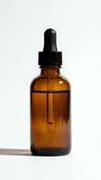 Amber glass dropper bottle with black rubber pipette on white background, for skincare serum, essential oil, or cosmetic product packaging concepts.