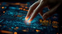 Finger touching glowing circuit board with blue and orange lights in dark background. Modern technology concept showing digital transformation and innovation.