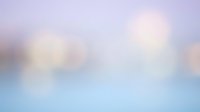 Soft pastel gradient background with dreamy bokeh lights in purple, pink and blue tones for creative design projects and presentations.