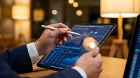 Professional businessman analyzing financial data and stock market charts on digital tablet in modern office environment with warm ambient lighting.