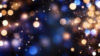 Magical glowing bokeh lights on dark background with blue and golden sparkles create dreamy festive atmosphere for holiday designs and celebrations.