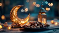 Glowing decorative crescent moon with traditional dates and lantern against blurred bokeh lights, creating magical Ramadan atmosphere on dark background.