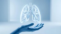 Glowing lung anatomy hologram floating above open hand in blue medical environment, representing respiratory health, pulmonology care, and healthcare innovation.