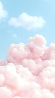 Dreamy pink cotton candy clouds float against light blue sky creating soft ethereal atmosphere for romantic and whimsical designs.