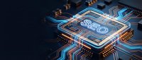 Advanced microprocessor chip with glowing blue circuit pathways and copper connections on dark background for technology and computing applications.