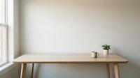 Minimalist wooden dining table with ceramic mug and small plant in bright modern interior with large window and neutral walls for home decor.