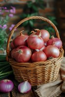 Fresh red onions in rustic wicker basket on wooden table with burlap cloth. Natural food photography perfect for cooking blogs, farm markets and healthy lifestyle publications.