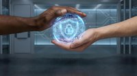 Two diverse male hands holding glowing digital padlock symbol representing cybersecurity, data protection, and secure technology transfer in modern office environment.