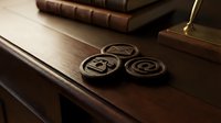 Antique metal symbols arranged on wooden desk with leather-bound books and brass lamp, representing communication, copyright, and registered trademark concepts for business and legal design projects.
