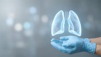 Medical professional in blue gloves holding glowing lung hologram for respiratory health care and pulmonary disease treatment concepts.