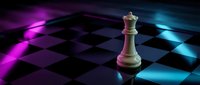 Golden chess king piece standing on checkered board with dramatic purple and blue lighting effects creating strategic game atmosphere.