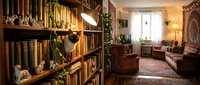 Cozy home library with wooden shelves filled with books, decorative objects, and warm lighting creating an inviting reading space for interior design projects.