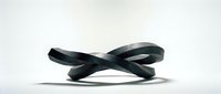 Dark green twisted ribbon bow on white background isolated for gift wrapping and decoration projects.