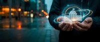 Businessman holding glowing digital bank building icon with circular data rings in palm against blurred city lights background for fintech concepts.