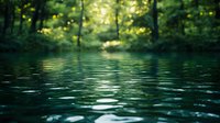 Tranquil forest lake surface with gentle ripples reflecting lush green trees and soft sunlight filtering through dense foliage, creating peaceful nature atmosphere.