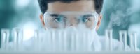 Young male scientist in protective goggles and face mask looking at test tubes in modern laboratory with teal background, conducting medical research.