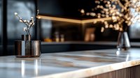 Minimalist marble kitchen counter with blooming cherry branches in metallic vase, modern interior design with soft bokeh lights and dark background.