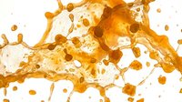 Liquid amber or golden honey splashing and flowing with droplets and bubbles against white background, suitable for beverage, food, cosmetic, and wellness product advertising.