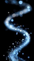 Magical glowing blue particles forming spiral path against black background, creating ethereal light trail effect with bokeh and sparkle elements.