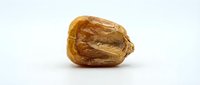 Single dried raisin fruit isolated on white background for healthy snacking and cooking ingredients in culinary applications.