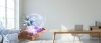 Businessman holding glowing holographic human body with medical icons, digital health technology concept in modern office.