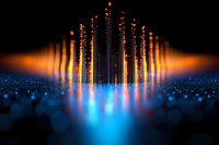 Glowing orange and blue light columns rising from reflective surface with bokeh effect, creating futuristic abstract technology background for digital concepts.