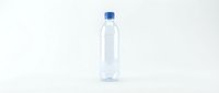 Clear plastic water bottle with blue cap isolated on white background for product photography and commercial design projects.