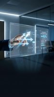 Businessman hand touching holographic display showing process optimization with upward arrow and performance metrics in modern office environment.