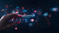 Finger touching glowing innovation text with digital elements and bokeh lights on dark background, futuristic technology concept for business transformation.