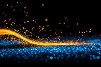 Magical glowing wave of golden sparkles flowing over shimmering blue particles against black background creates ethereal light trail effect.