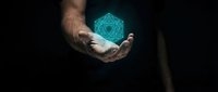 Male hands holding glowing turquoise geometric sacred geometry symbol in dark space. Digital hologram projection concept for technology and spirituality themes.