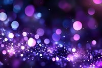 Abstract purple and pink bokeh lights background with glittering particles and soft glowing circles creating magical atmosphere for celebrations and events.