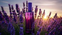 Luxury perfume bottle surrounded by blooming lavender flowers at golden sunset creating romantic aromatherapy and beauty product concept for cosmetics branding.