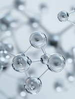 Glass molecular structure model with transparent spheres and connecting bonds for chemistry education and scientific research presentations.