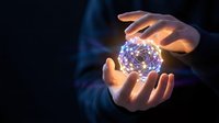 Hands holding glowing digital sphere with neural network connections, representing innovation, technology, artificial intelligence, and future digital transformation concepts.