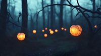 Glowing jack-o-lanterns illuminating a misty forest path at dusk, creating an eerie Halloween atmosphere in the dark woods.