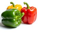 Fresh colorful bell peppers isolated on white background. Green, yellow and red sweet peppers for healthy cooking and nutrition concepts.