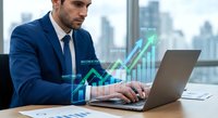 Professional businessman analyzing financial data with digital growth charts and analytics overlay while working on laptop in modern office environment.