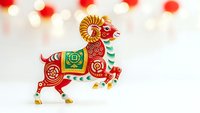 Decorative Chinese zodiac horse with ornate red and green patterns, traditional folk art style for lunar new year celebrations and cultural designs.