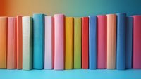 Row of colorful hardcover books standing in line against gradient background, spines showing vibrant pastel shades of pink, blue, yellow and coral creating rainbow effect.