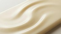 Smooth cream or beige wavy texture with soft highlights and shadows, suitable for backgrounds, cosmetics packaging, skincare product displays, and luxury branding materials.