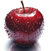 Fresh red apple covered in pure water drops and dew against white background, dramatic lighting creates reflection beneath fruit. Isolated for commercial use.